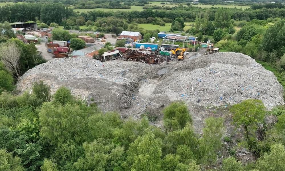 Burnham promises action on waste crime as 4 arrested over Wigan site